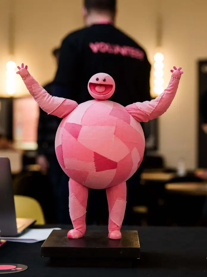 A model of a pink cartoonish creature on display at the Cardiff Animation Festival.